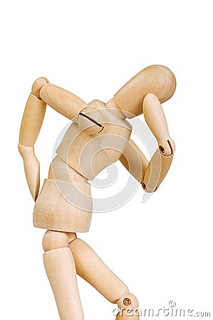 Statuette figure wooden man human makes shows experiences emotional action on a white background. Stock Photo