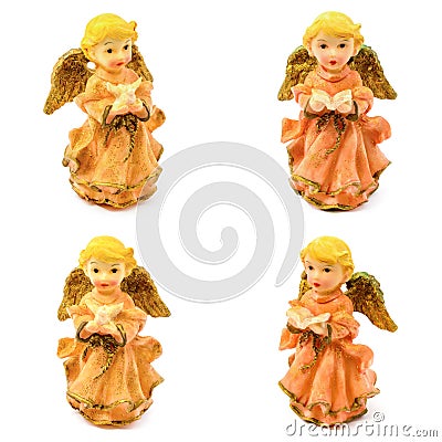 Statuette of porcelain angels with book and pigeon isolated on white background Stock Photo