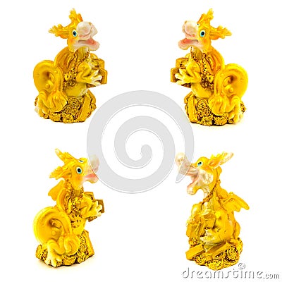 Statuettes of gold dragons with money isolated on a white background Stock Photo