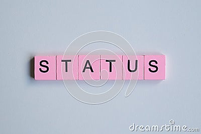 Status word wooden cubes Stock Photo