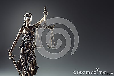 Statute of Justice. Bronze statue Lady Justice holding scales an Stock Photo