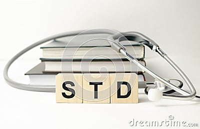 STD Sexually transmitted infections text on wooden cubes. medical concept Stock Photo