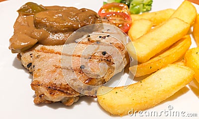 Steak and chips is very good protein and enegy source. Stock Photo