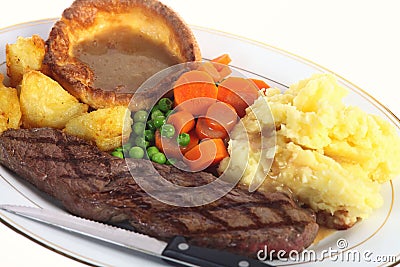 Steak dinner with gravy Stock Photo