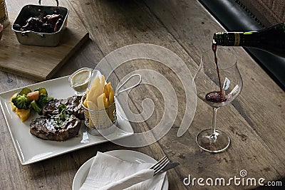 Steak dinner with wine Stock Photo