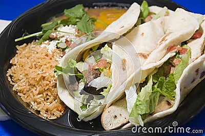 steak fajita chicken fajita refried beans a Stock Photo