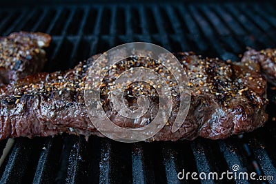 Steak that has been spiced with Montreal steak spice Stock Photo