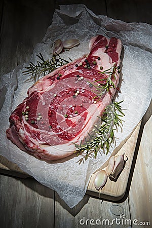 Steak over a wooden background Stock Photo