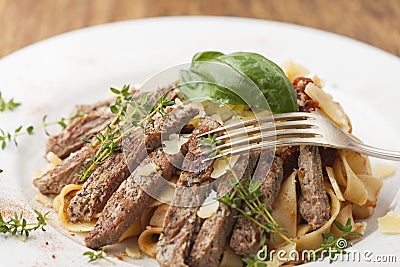 steak on pasta Stock Photo