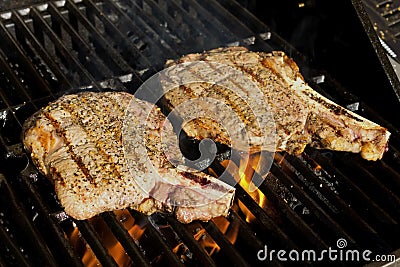 Steaks on the grill Stock Photo