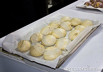 Steam buns from yeast wheat dough on a tray Stock Photo