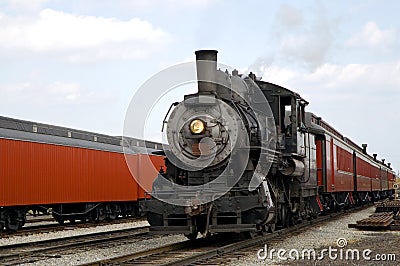Steam locomotive and train Stock Photo