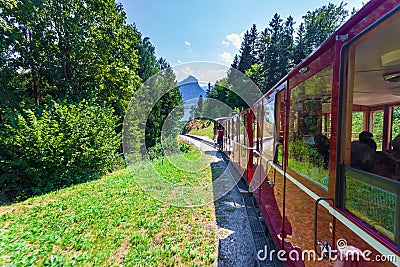 Steam locomotive of a vintage cogwheel railway going to Schafberg Peak Editorial Stock Photo
