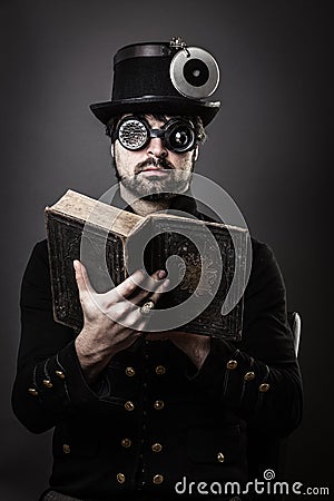 Steam punk man with book Stock Photo