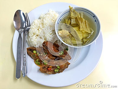 Steam rice with Fried fish, boiled vegetables Stock Photo