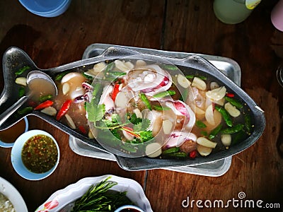 Steam squid with spicy chilli and lemon sauce Stock Photo