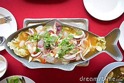 Steam squid with spicy lemon juice soup Stock Photo