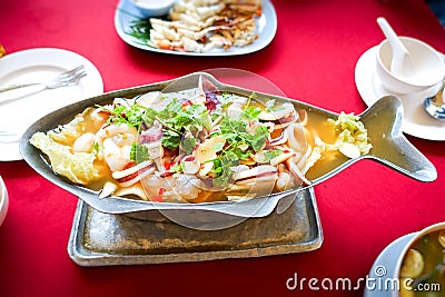 Steam squid with spicy lemon juice soup Stock Photo