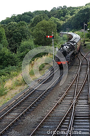 Steam train turning corner Editorial Stock Photo