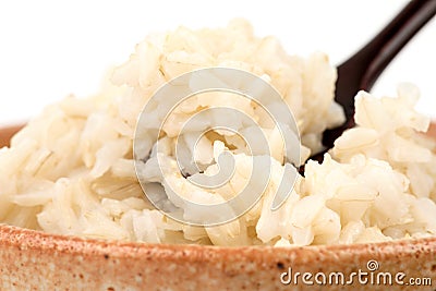 Steamed brown rice isolated on white background Stock Photo