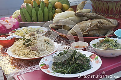 Steamed chicken, food and fruits offering to spirits Stock Photo