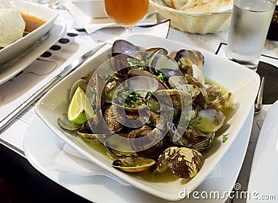 Steamed Clams in a Lime Butter Sauce Stock Photo