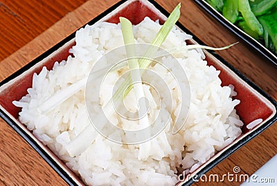 Steamed rice, spring onion dressing Stock Photo