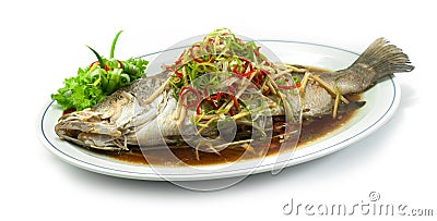 Steamed Sea bass Snapper Fish with Soy Sauce Chinese food Stock Photo