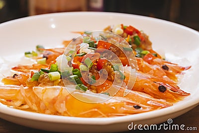 Close-up of steamed shrimp with minced garlic Stock Photo