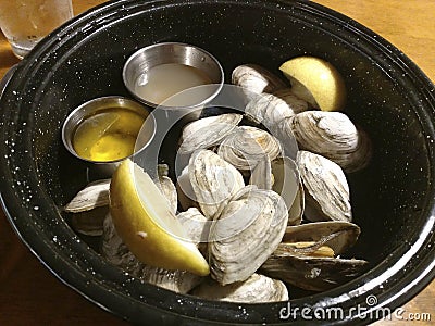 Steamed Soft Shell Clams with Butter and Lemon Stock Photo