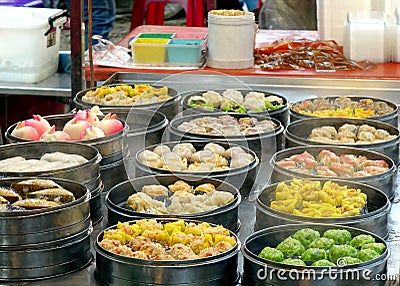 Steamers with Dim Sum Dishes Stock Photo