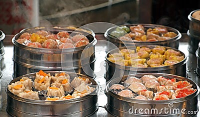 Steamers with Dim Sum Dishes Stock Photo
