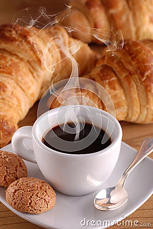 Steaming espresso coffee in white cup Stock Photo