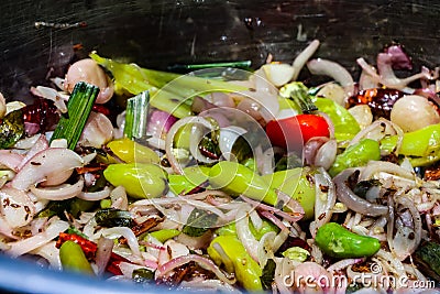 Steaming mixed vegetables in the wok, asian style cooking Stock Photo
