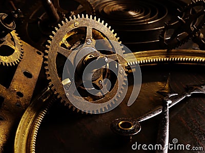 Steampank background. Old dirty gear wheel of a disassembled vintage watch Stock Photo