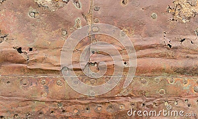 Steampunk Abstract background of old riveted copper sheet cladding Stock Photo