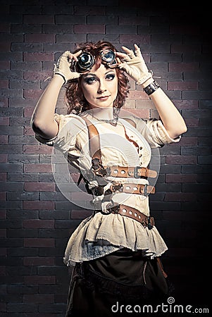 Steampunk girl with goggles Stock Photo