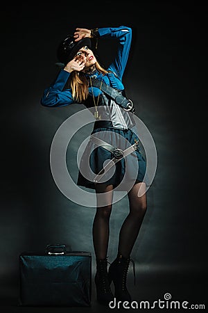 Steampunk girl with retro bag. Stock Photo