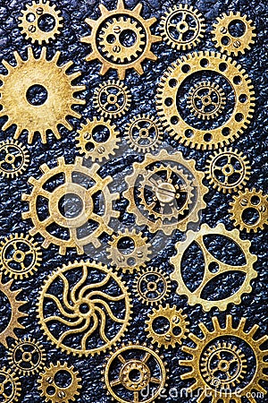 Steampunk mechanical cogs gears wheels on leather background Stock Photo