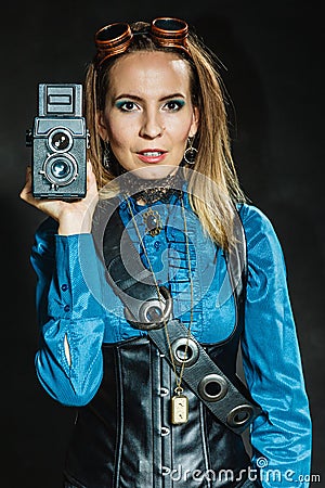 Steampunk with old retro camera. Stock Photo