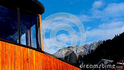 Steamship Captain On The Deck With Snow Covered Alps Beyond Stock Photo