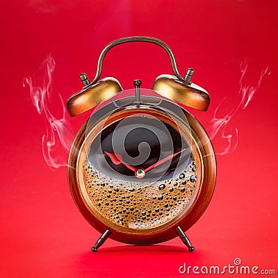 Steamy coffee drink collage. Hot coffee inside of a`larm clock as a symbol coffee time Stock Photo