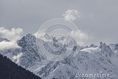 Steamy Grand massif mountain range Stock Photo