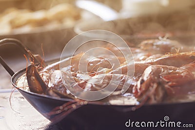 Steamy Homemade Paella Traditionally Cooked with Prawns and Shellfish Stock Photo