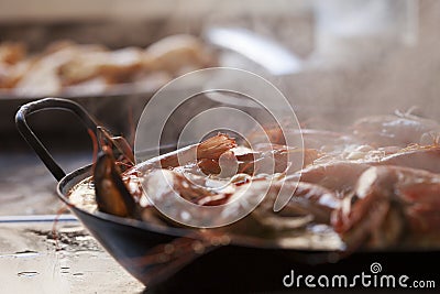 Steamy Homemade Paella Traditionally Cooked with Prawns and Shellfish Stock Photo