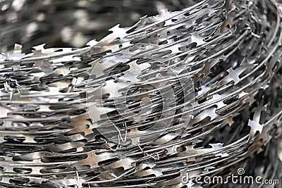 Steel barbed wire close-up. Wire coil for safety and security. Stock Photo