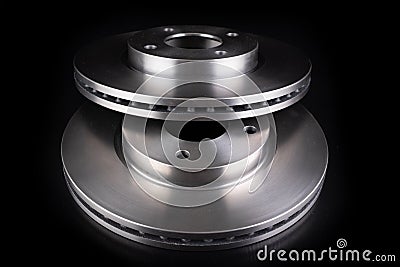 Steel brake discs for a passenger car. New spare parts for car repairs Stock Photo