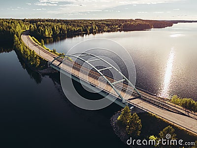 Steel bridge over lake at Suomussalmi Finland Stock Photo