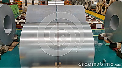 Steel coil in factory warehouse, Raw material for many industries Stock Photo