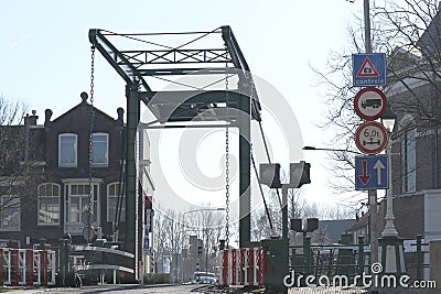 steel drawbridge over the Vliet at the sluices of Leidschendam Editorial Stock Photo